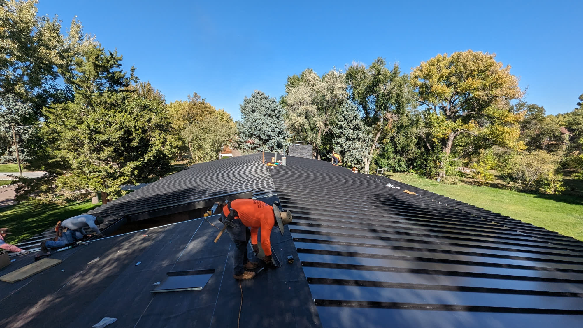 DG Metals snap-lock standing seam panel install in progress, Lakewood, CO