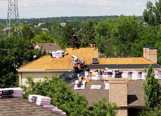 Insulated steel sectional garage door on a suburban Colorado home