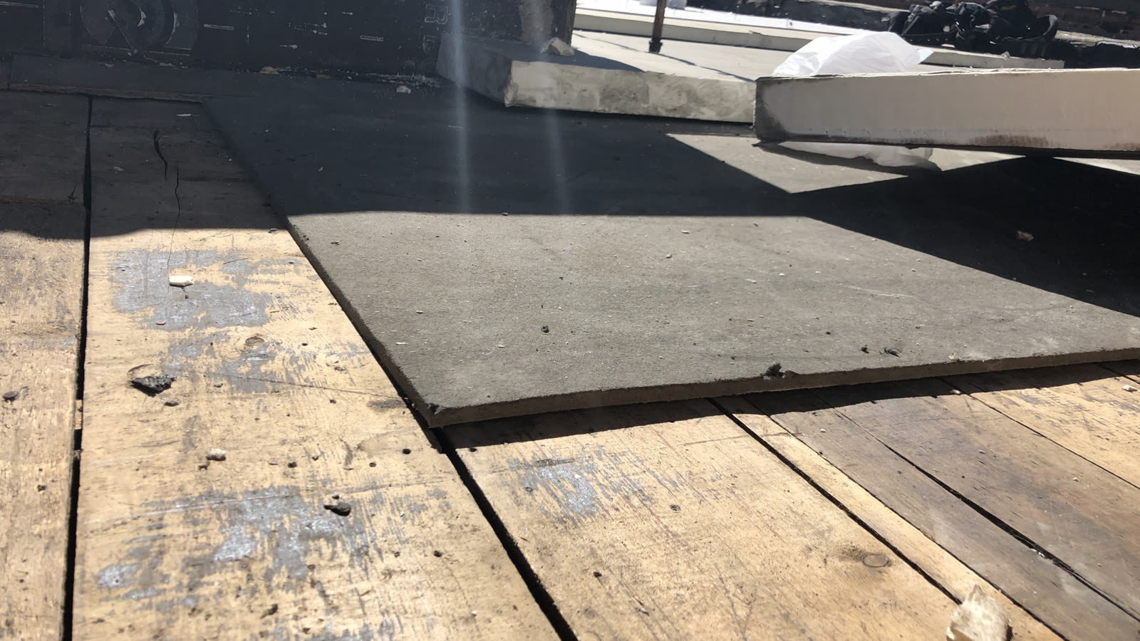 White TPO single-ply membrane installed on a commercial flat roof in Colorado